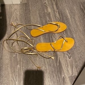 Gold leather wrap sandals